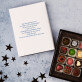 Vrolijk kerst kerststal - Pralines van belgische chocolade